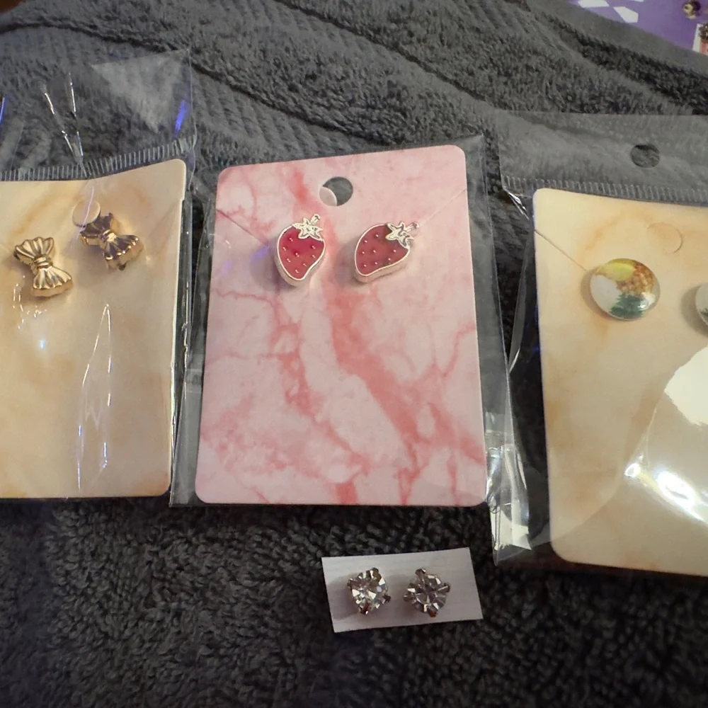 4 pairs of earrings BUNDLE New in pkg. Bows Strawberries zirconium & pin…